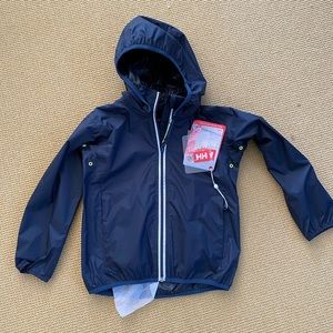 BNWT Helly Hansen packable rain jacket.